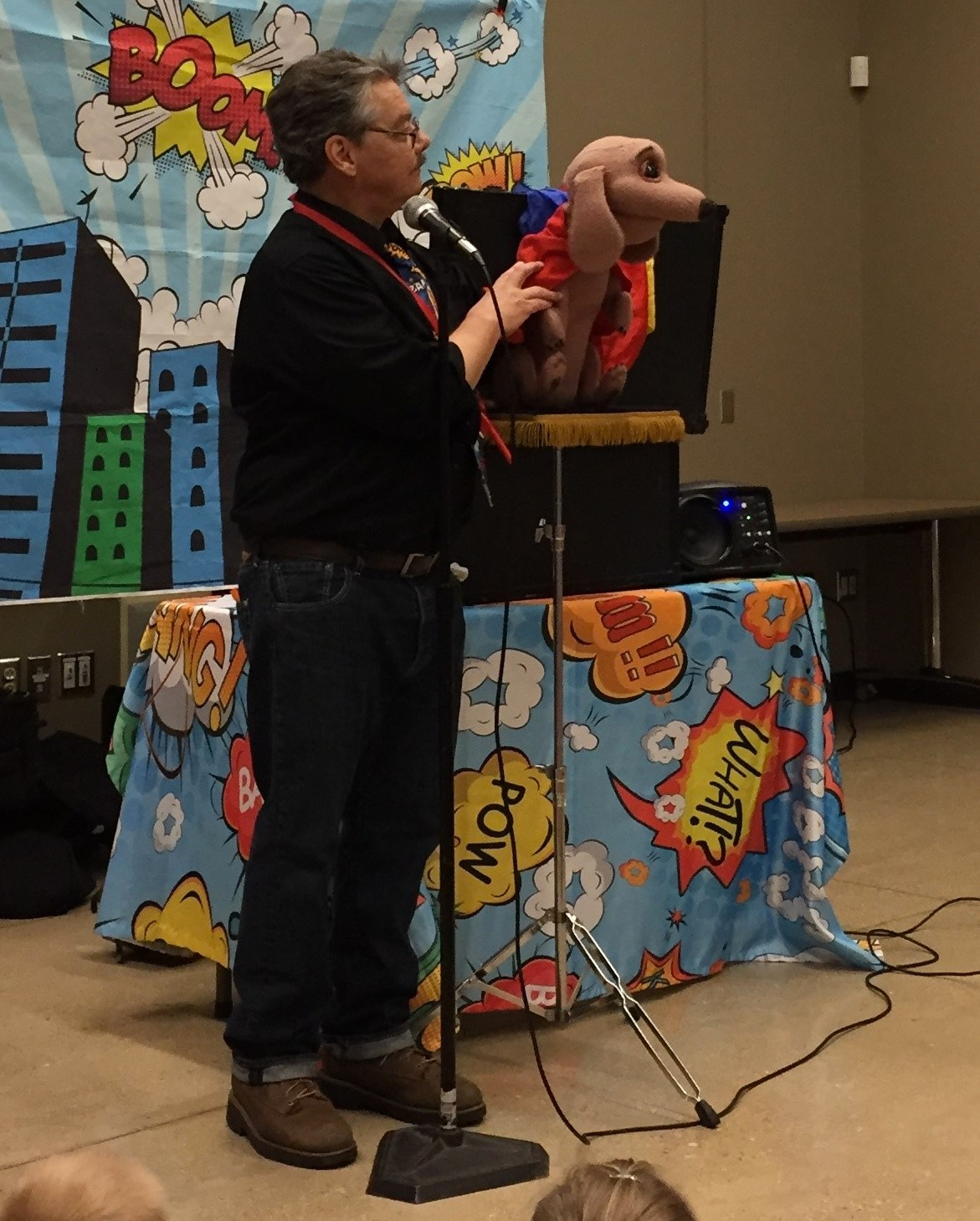 David Pitts and his puppet friend Frank the Wonder Dog entertain a family audience